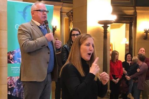 Photo of Governor Tim Walz giving a speech at the MN Capitol