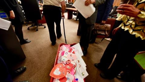 Cat Salonek, advocacy director for the LGBTQ group OutFront Minnesota, delivers a wagon of Valentine’s Day cards urging lawmakers to ban so-called “gay conversion therapy” at the State Capitol in St. Paul on Wednesday, Feb. 13, 2019. (Dave Orrick) / Pioneer Press)