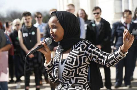 U.S. Rep Ilhan Omar, D-Minn., speaks to support LGBTQ and allied high school students from across the state of Minnesota who marched to the State Capitol steps Thursday, March 21, 2019 in St. Paul, Minn. to urge lawmakers to protect LGBTQ Minnesotans and youth from the effects of so-called conversion "therapy."