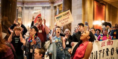 More than 100 protesters sang and cheered in the State Capitol last month as House representatives discussed an amendment regarding conversion therapy. Minnesota has not banned the practice. Photo by Glen Stubbe of the Star Tribune.