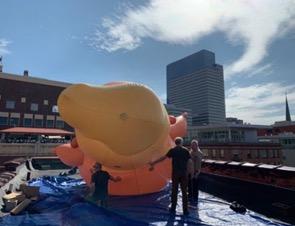A picture of the "Trump baby" balloon on a rooftop.