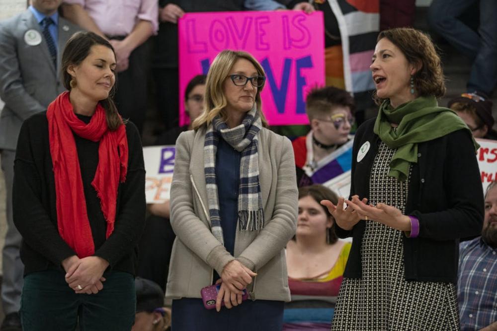 (Left) Minnesota State Representatives Liz Olson and Jennifer Schultz listen as Duluth Mayor Emily Larson shared her thoughts on Conversion Therapy and expressed her support of the ban on a state level.